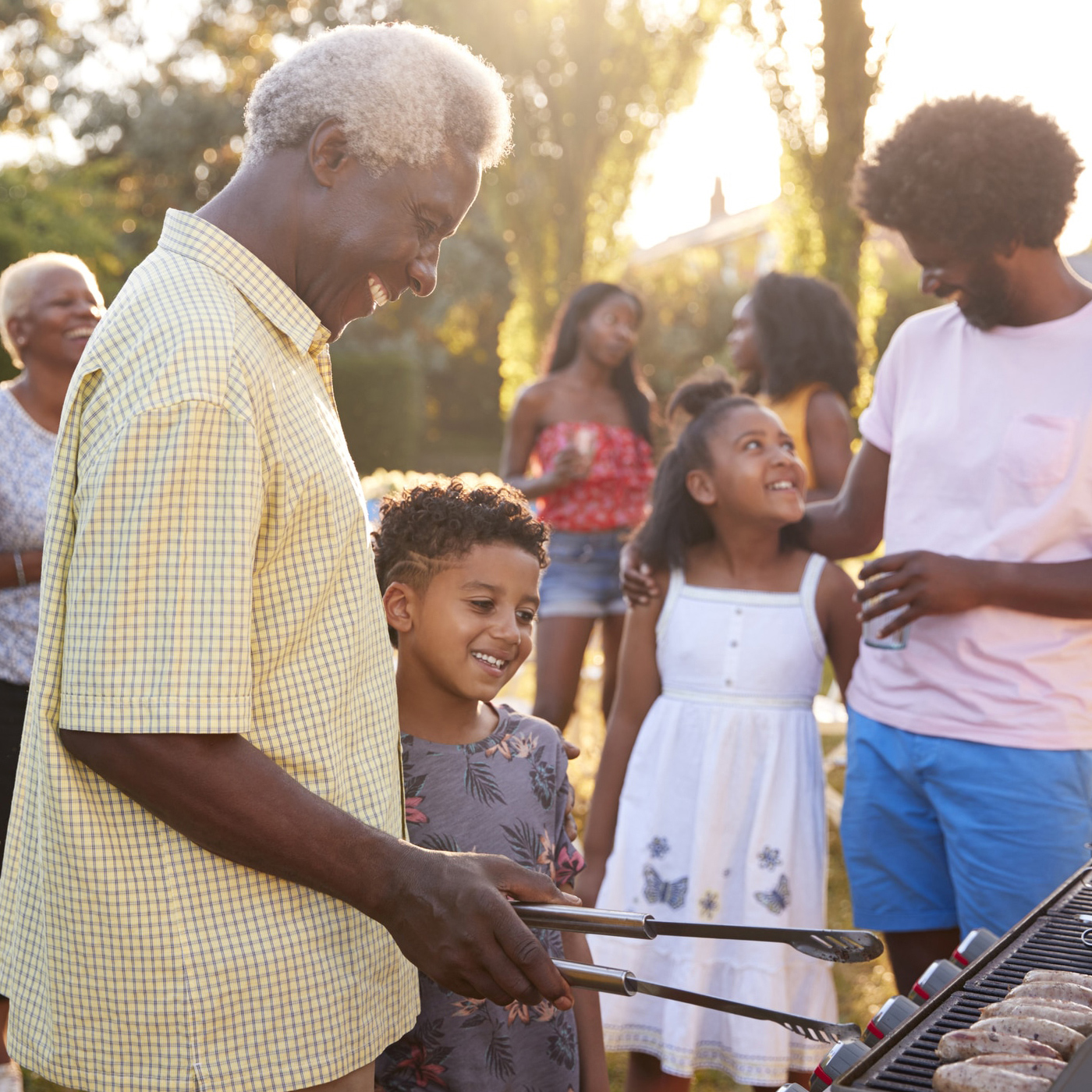 african american family of different generations having a bbq